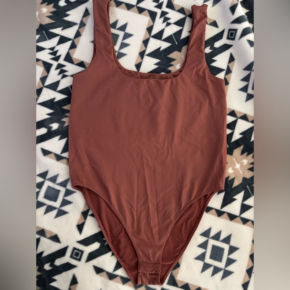 A New Day One-Piece with snaps